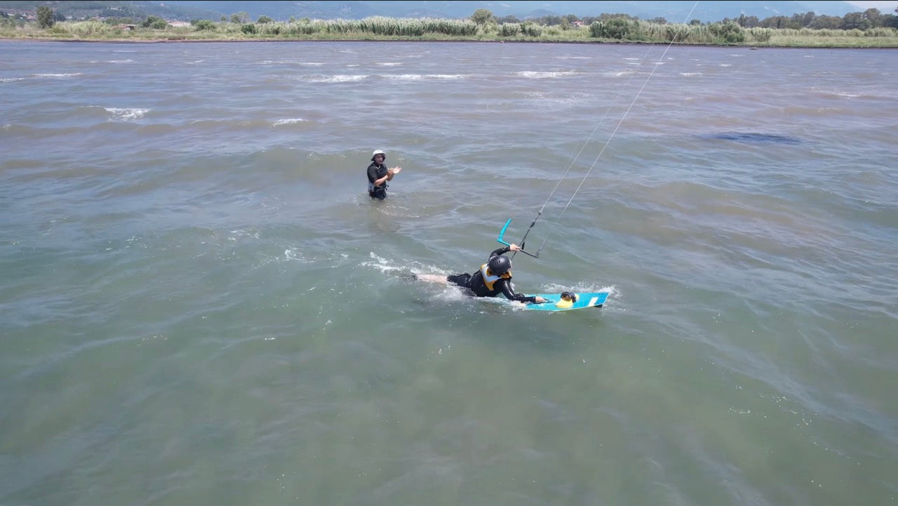 Student is learning to body drag in Nafpaktos, Greece, WindCircus. 
