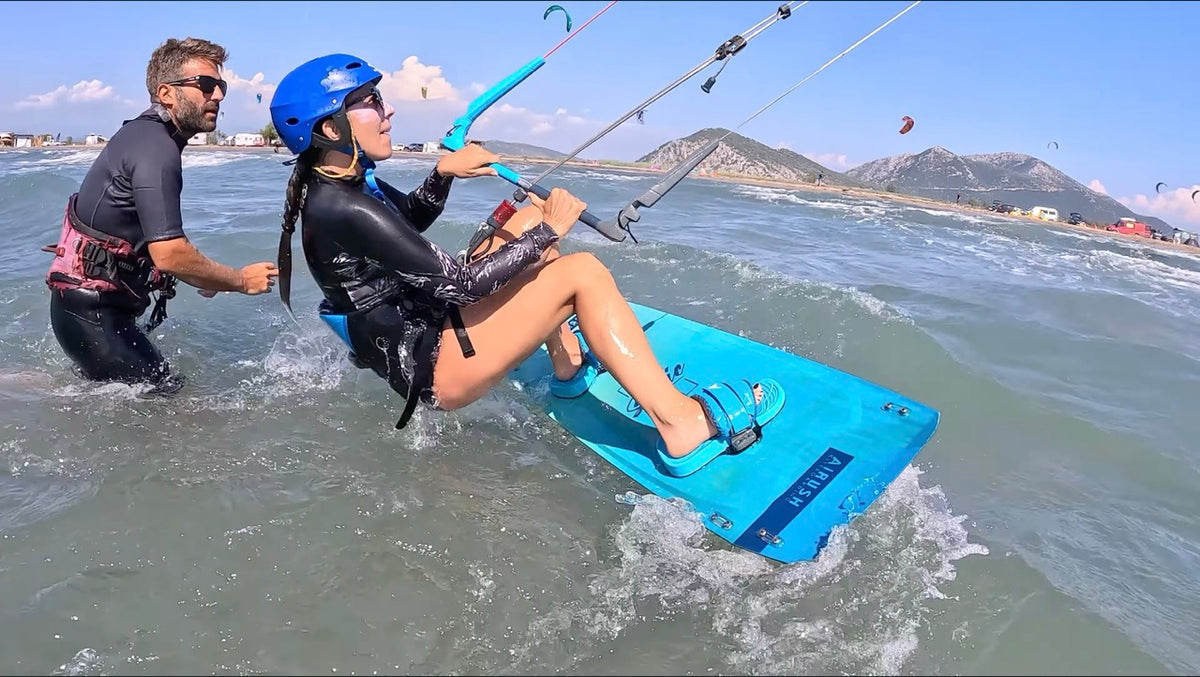 Kitesurfing Student is learning to waterstart in Dioni, Greece, WindCircus. 